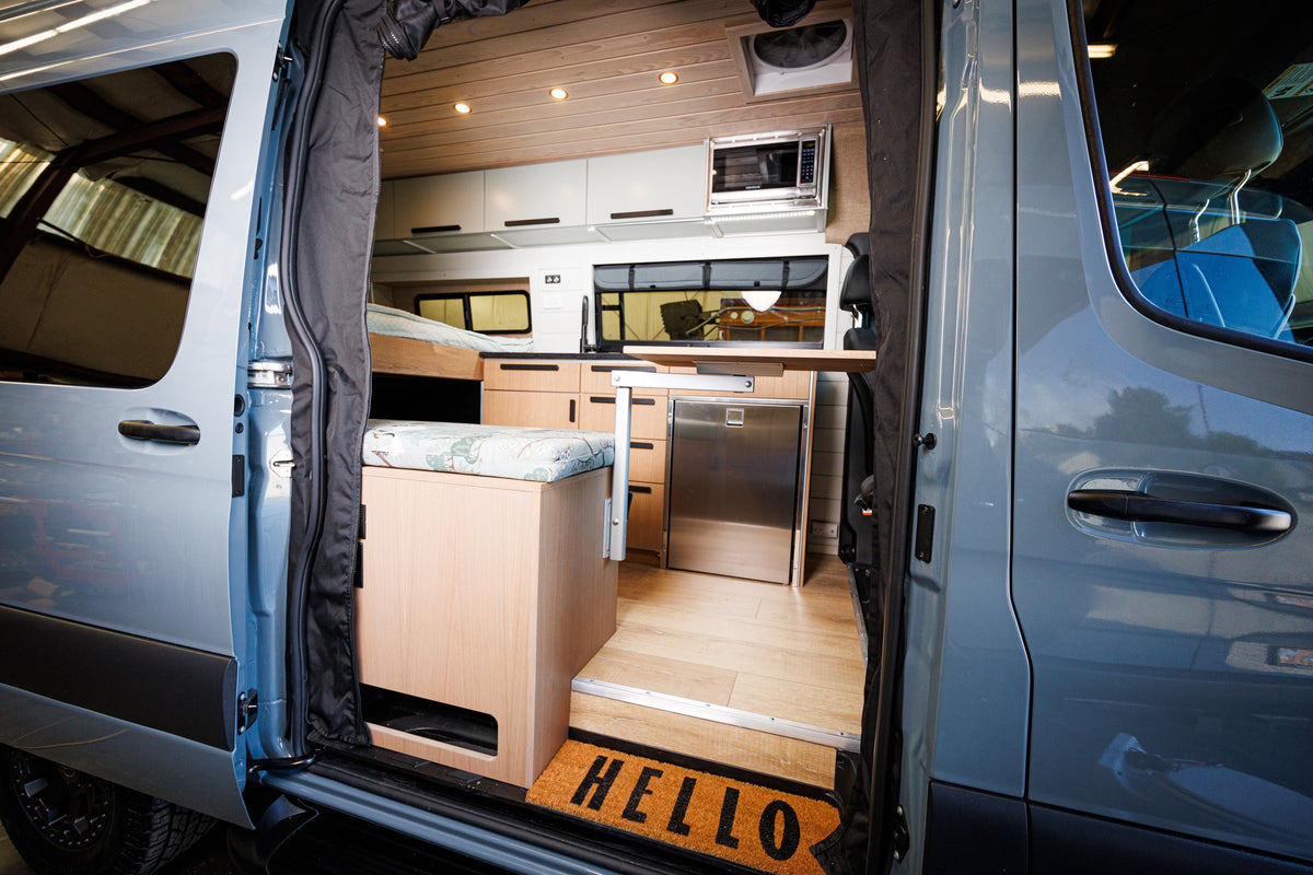 Finished van interior with galley and seating